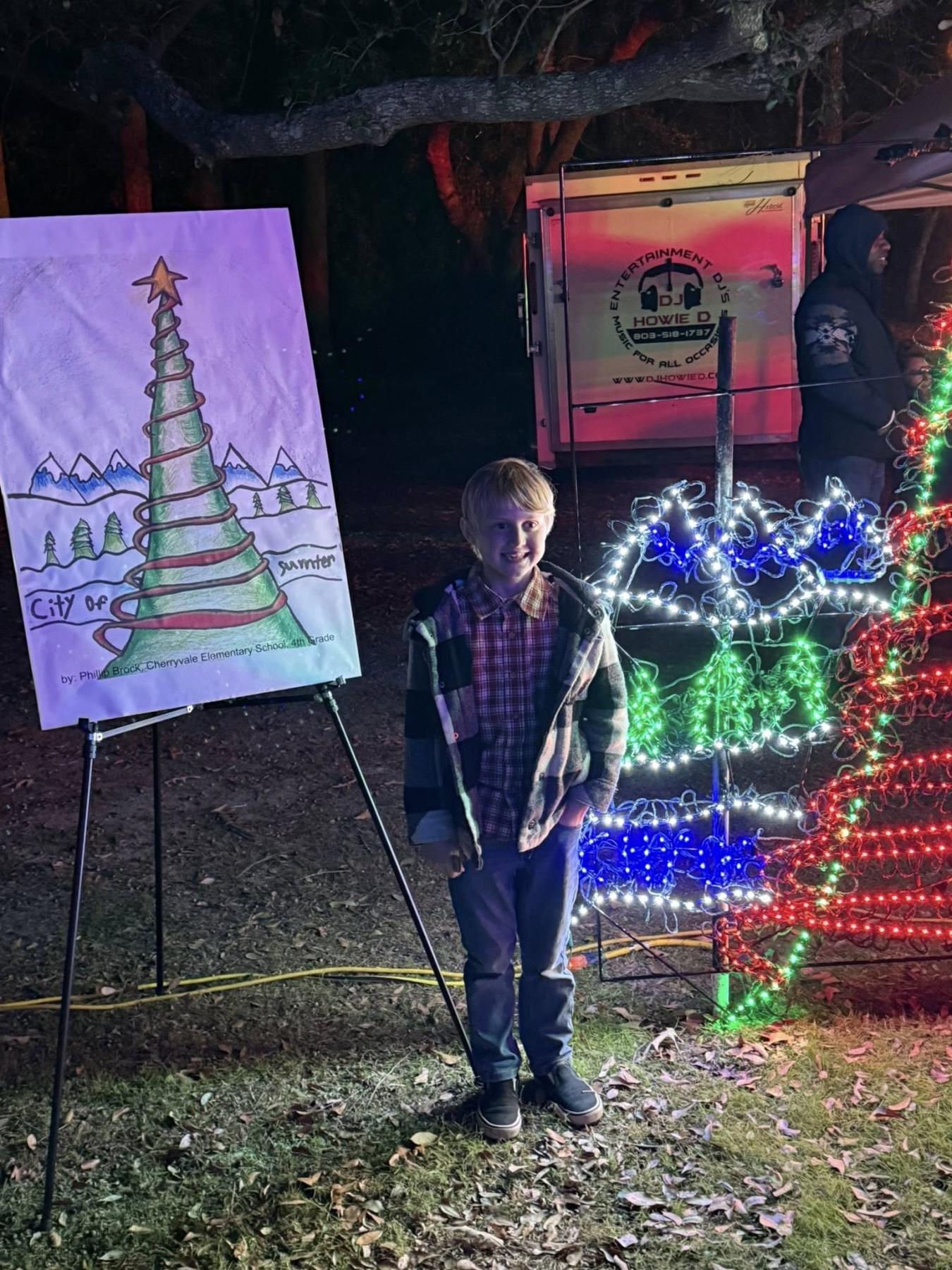 Mayor's Christmas card winner stands by his art and its recreation in lights.