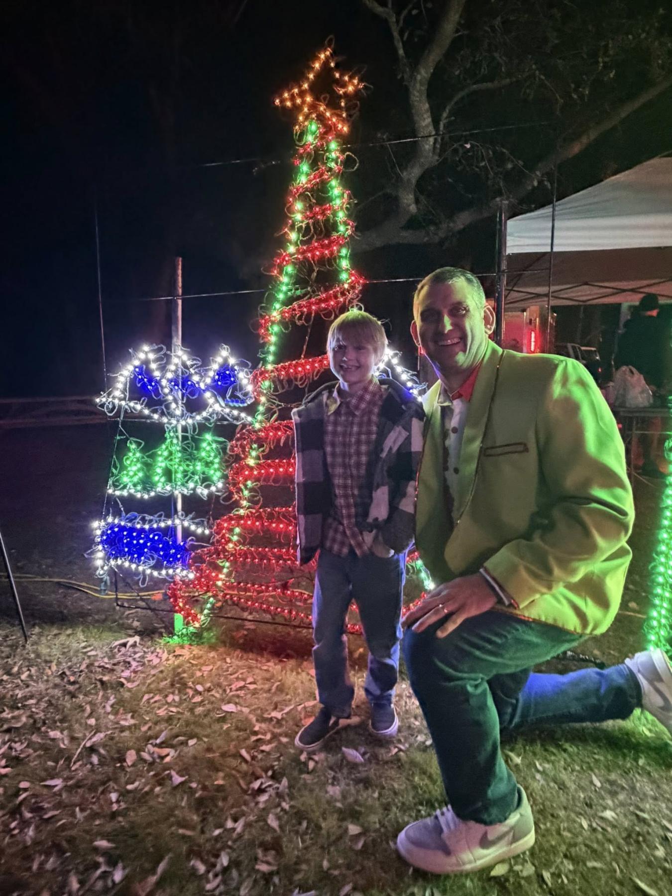 Mayor David Merchant poses with the Christmas Card Winner.