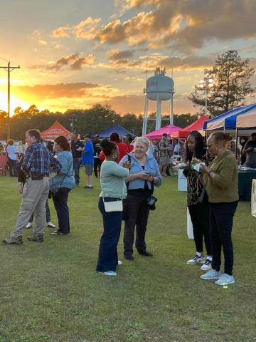 Attendees Enjoying The Feast